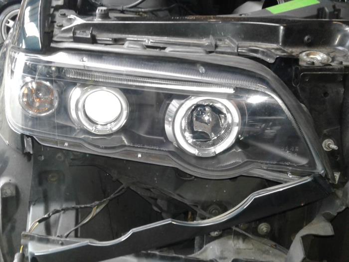 Headlight, right from a BMW X5 (E53) 4.4 V8 32V 2003