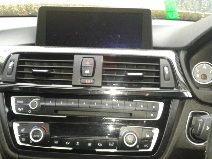 Heater control panel from a BMW 4 serie (F32) M4 3.0 24V TwinPower Turbo 2015