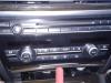 Panel de control de aire acondicionado de un BMW 7 serie (F01/02/03/04) 730d 24V 2010