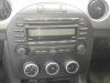 Radio CD player from a Mazda MX-5 (NC18/1A), 2006 / 2014 1.8i 16V, Convertible, Petrol, 1.798cc, 93kW (126pk), RWD, L828, 2005-03 / 2014-12, NC18; NC1A 2009
