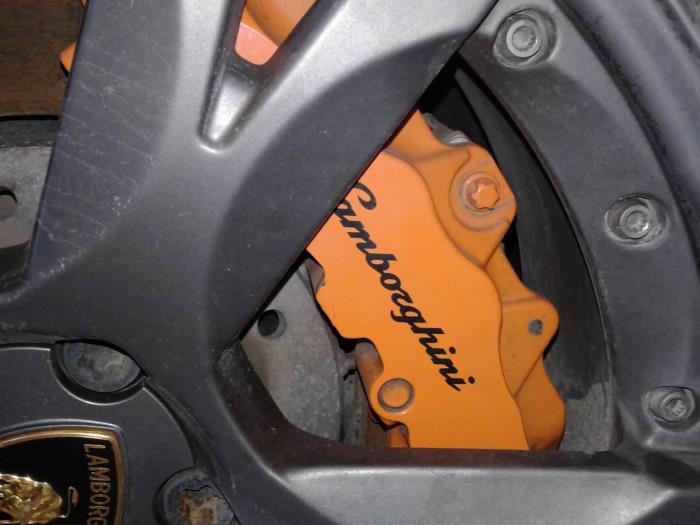 Front brake calliper, left from a Lamborghini Gallardo 5.2 V-10 40V FSI LP560-4 2011
