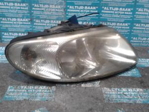 Used Headlight, right Chrysler Voyager Price on request offered by "Altijd Raak" Penders