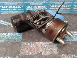 Used Oil filter housing Isuzu D-MAX Price on request offered by "Altijd Raak" Penders