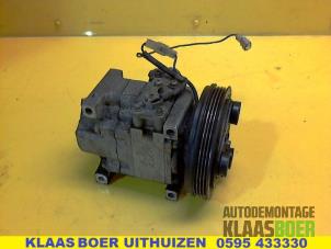 Używane Pompa klimatyzacji Mazda 323 Fastbreak (BJ14) 1.5 LX,GLX 16V Cena € 50,00 Procedura marży oferowane przez Autodemontage Klaas Boer