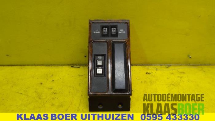 Electric window switch from a Chrysler Le Baron Coupé 2.5 Turbo 1990