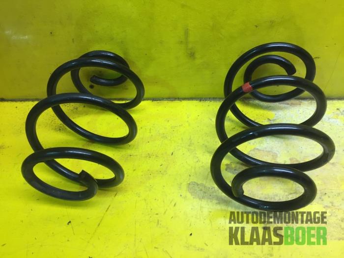 Rear coil spring from a Renault Twingo II (CN) 1.2 16V 2010