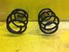 Rear coil spring from a Renault Twingo II (CN) 1.2 16V 2010