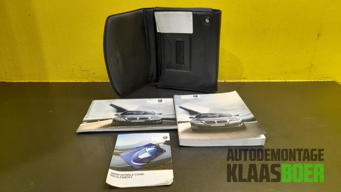 Instruction Booklet from a BMW 5 serie (F10) 530d 24V 2011