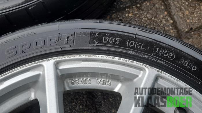 Sport rims set + tires from a Fiat Grande Punto (199) 1.2 2006