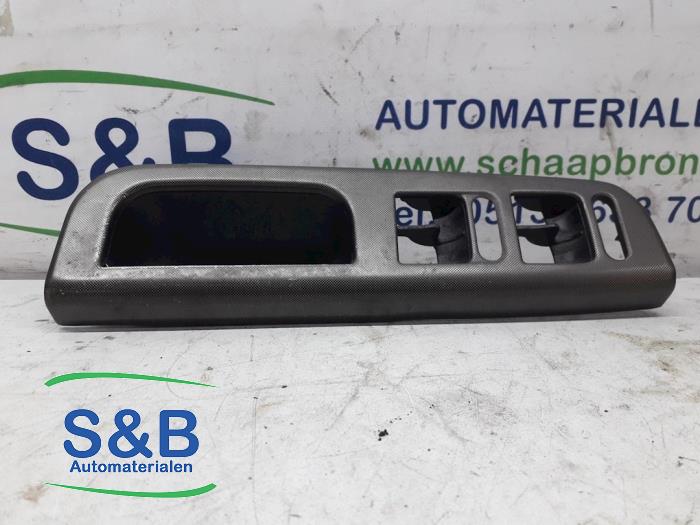 Door window switch trim