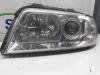 Headlight, left from a Audi A4 Avant (B5)  2000