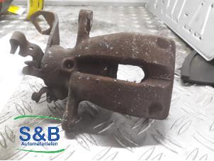 Used Rear brake calliper, left Mini Mini (R56) 1.6 16V Cooper Price € 60,00 Margin scheme offered by Schaap & Bron
