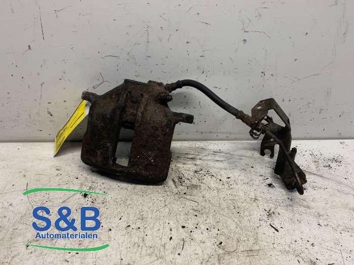 Front brake calliper, left from a Audi Cabrio (B4) 2.3 E 1993