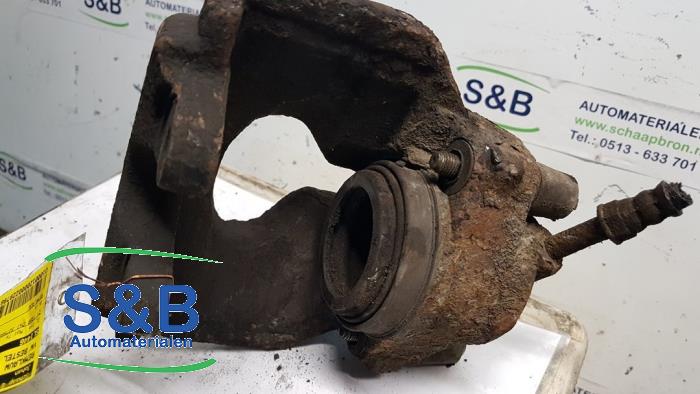 Front brake calliper, left from a Volkswagen Transporter T6 2.0 TDI 150 2015