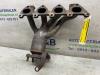 Exhaust manifold + catalyst from a Seat Arosa (6H1) 1.4 MPi 2003