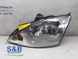 Used Headlight, left Ford Focus 2 Wagon 1.6 Ti-VCT 16V Price € 25,00 Margin scheme offered by Schaap & Bron