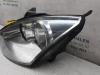 Headlight, left from a Ford Focus 2 Wagon 1.6 Ti-VCT 16V 2005