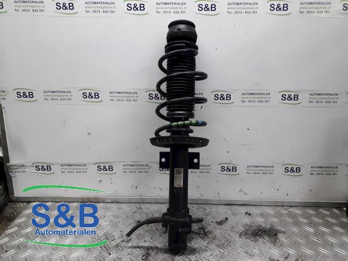 Front shock absorber rod, left from a Seat Ibiza IV (6J5) 1.2 12V 2014