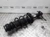 Front shock absorber rod, left from a Seat Ibiza IV (6J5) 1.2 12V 2014