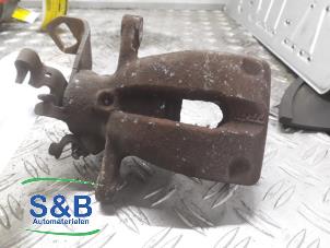 Used Rear brake calliper, left Mini Mini (R56) 1.6 16V Cooper Price € 30,00 Margin scheme offered by Schaap & Bron