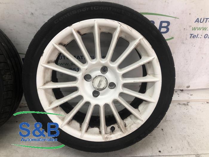 Set of wheels + tyres from a MINI Mini Cooper S (R53) 1.6 16V 2004
