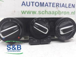 Używane Panel sterowania nagrzewnicy Volkswagen Polo V (6R) 1.4 16V Cena € 40,00 Procedura marży oferowane przez Schaap & Bron