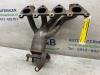 Exhaust manifold + catalyst from a Seat Cordoba (6L2), Saloon, 2002 / 2009 2003
