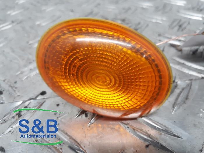 Indicator lens, front left from a MINI Mini (R56) 1.4 16V One 2007