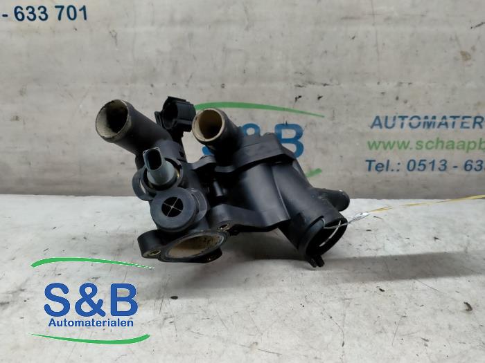Thermostat housing from a Seat Ibiza III (6L1) 1.4 16V 75 2004