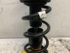 Fronts shock absorber, left from a Audi A4 (B9) 1.4 TFSI 16V 2016