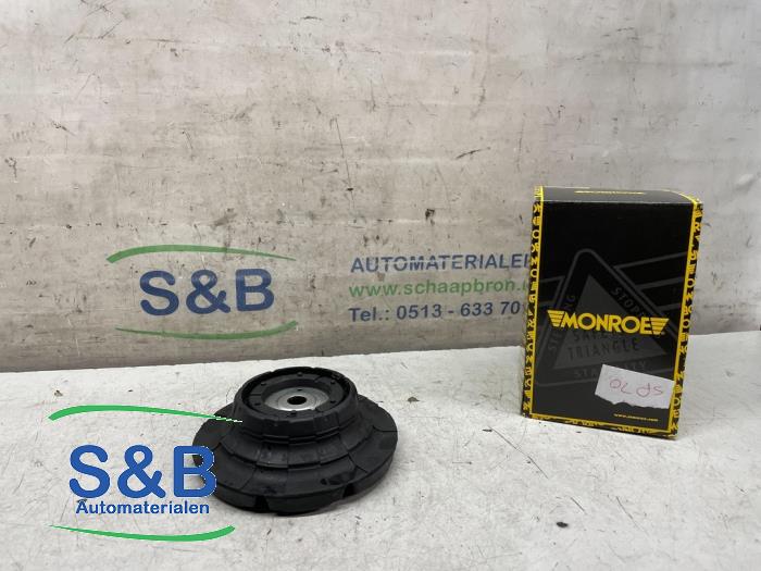 Lower shock absorber mount, outer left from a Volkswagen Multivan T5 (7E/7HC/7HF/7HM) 2.0 TDI 4Motion 2010