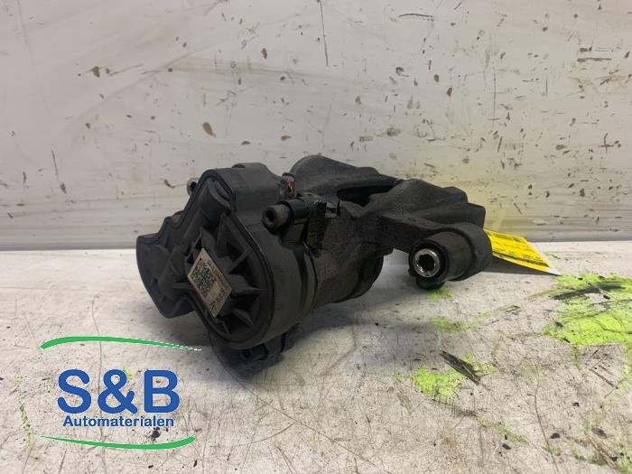 Rear brake calliper, left from a Volkswagen Caddy Cargo V (SBA/SBH) 2.0 TDI BlueMotionTechnology 2022