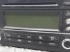 Radio CD player from a Volkswagen Eos (1F7/F8) 2.0 FSI 16V 2006