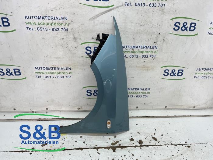 Front wing, left from a Seat Ibiza ST (6J8) 1.2 TDI Ecomotive 2011