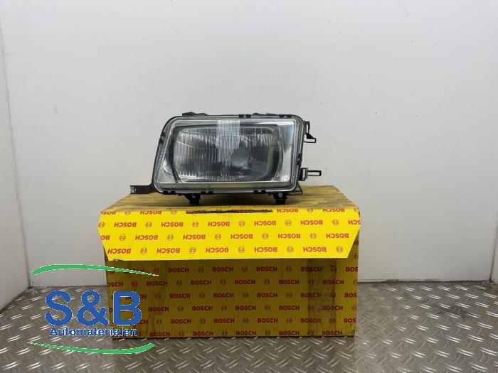 Nowe Reflektor lewy Audi 80 Avant (B4) 2.0 E,S Cena € 101,64 Z VAT oferowane przez Schaap & Bron