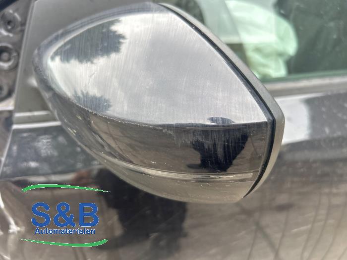 Außenspiegel links van een Volkswagen Polo V (6R) 1.4 TDI DPF BlueMotion technology 2014