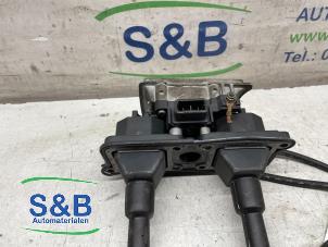 Zündspule van een Volkswagen Touareg (7LA/7L6) 2.5 TDI R5 2004