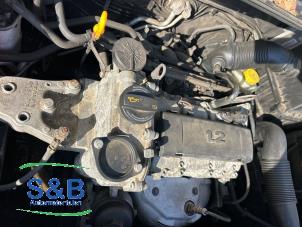 Engine from a Seat Ibiza IV (6J5) 1.2 12V 2010