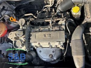 Engine from a Seat Ibiza IV (6J5) 1.2 12V 2010
