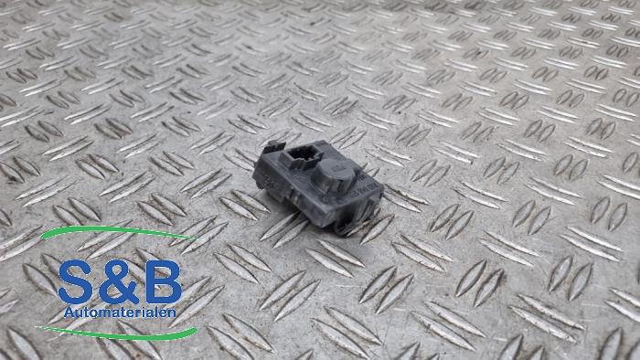 Tail light bulb cover holder