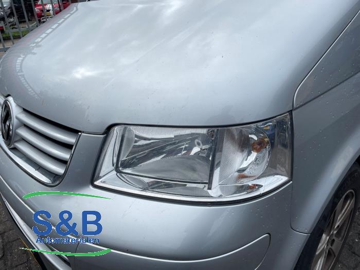 Używane Reflektor lewy Volkswagen Transporter T5 2.5 TDi Cena € 55,00 Procedura marży oferowane przez Schaap & Bron