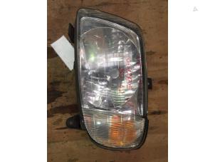Used Headlight, left Daihatsu Cuore (L251/271/276) Price € 25,00 Margin scheme offered by F. van den Mosselaar autodemontage