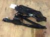 Convertible top hinge from a BMW 1 serie (E88) 120i 16V 2009