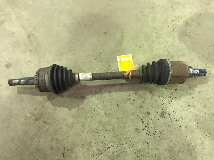 Front drive shaft, left from a Nissan Almera (N16) 1.5 16V 2001