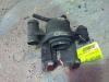 Front brake calliper, left from a Toyota Starlet (EP8/NP8) 1.3 Friend,XLi 12V 1994