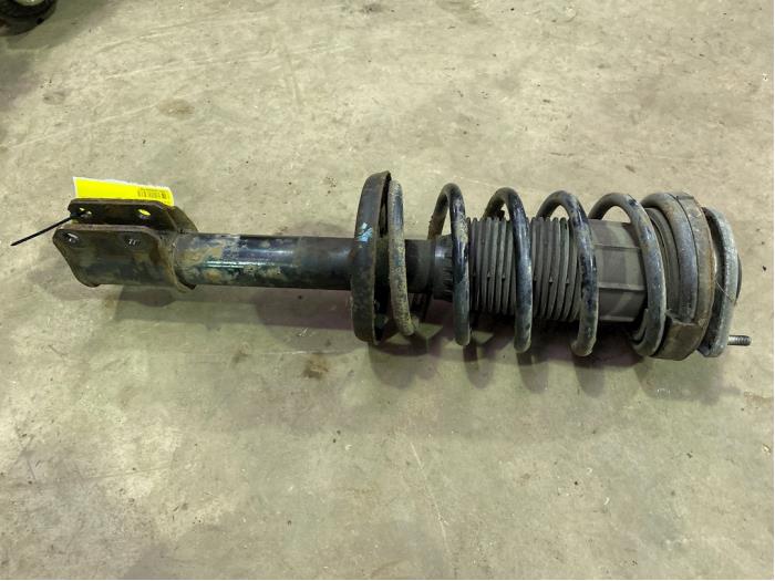 Front shock absorber rod, left from a Opel Corsa B (73/78/79)  1998