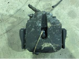 Used Front brake calliper, left BMW 5 serie (E39) Price € 25,00 Margin scheme offered by F. van den Mosselaar autodemontage