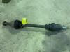 Front drive shaft, left from a Ford Focus 1 Wagon, Estate, 1998 / 2004 2002