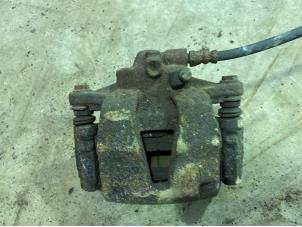 Used Front brake calliper, left Fiat Doblo (223A/119) Price € 25,00 Margin scheme offered by F. van den Mosselaar autodemontage
