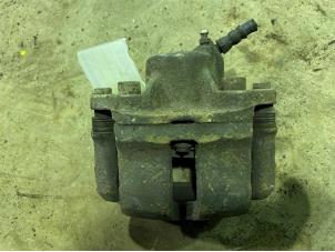 Used Front brake calliper, left Renault Megane (BA/SA) Price € 25,00 Margin scheme offered by F. van den Mosselaar autodemontage